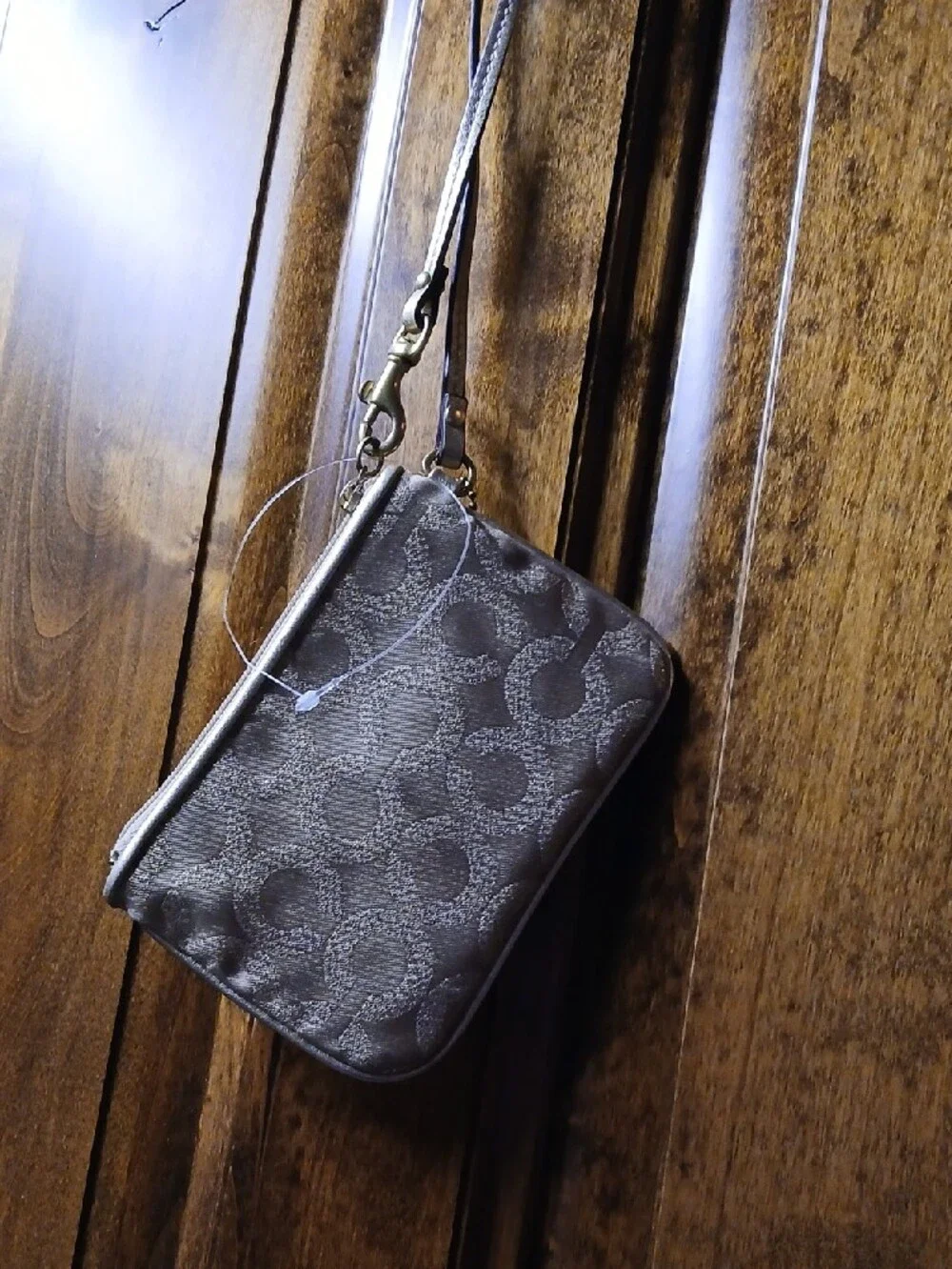 Coach Gold Signature Wristlet with Metallic Logo